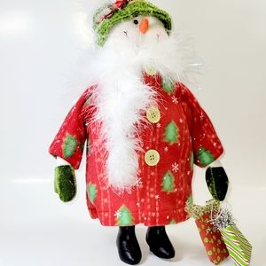 New Snow Woman Shopper Wearing Coat, Feathers, Knit Hat & Carrying Shopping Bags